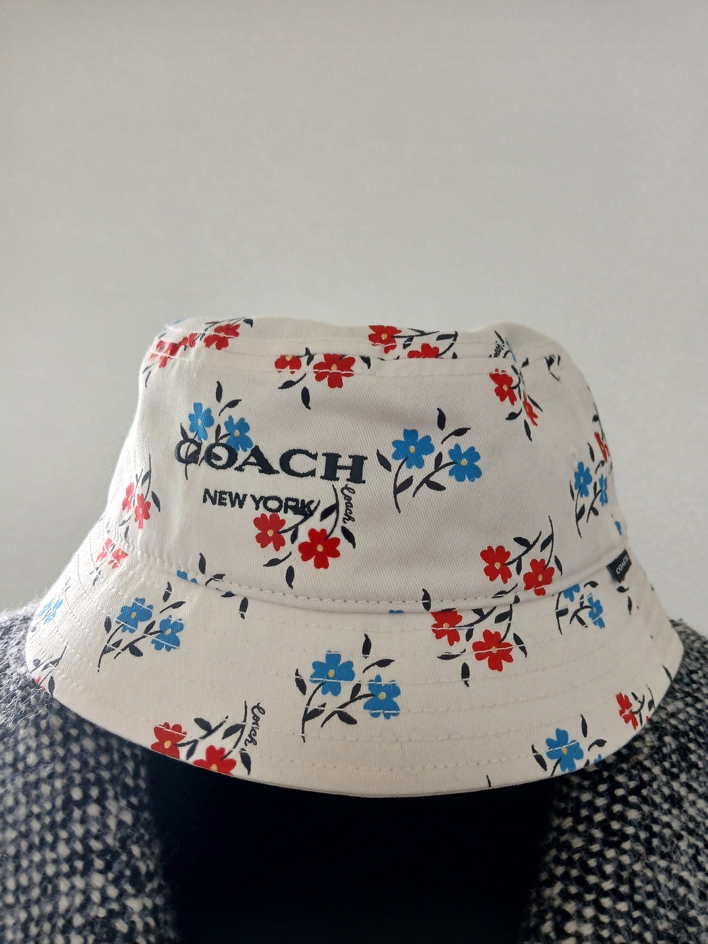Coach Floral Bucket Hat in White with Red and Blue Flowers